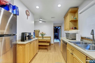 This beautiful raised ranch offers a great location with - photo 8