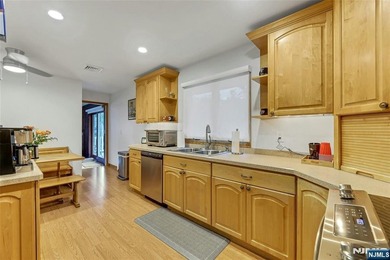 This beautiful raised ranch offers a great location with - photo 9