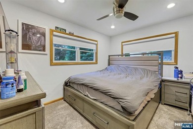 This beautiful raised ranch offers a great location with - photo 10
