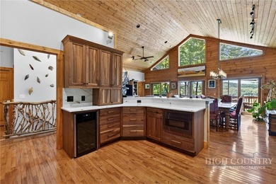 Magnificent home embraced by rhododendrons and hardwood trees - photo 18