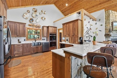 Magnificent home embraced by rhododendrons and hardwood trees - photo 21