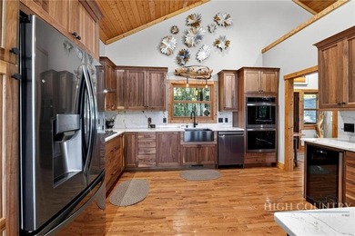 Magnificent home embraced by rhododendrons and hardwood trees - photo 22