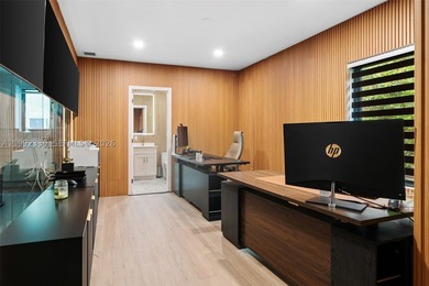 Fully gated and completely rebuilt in 2022, this modern home - photo 22