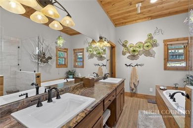 Magnificent home embraced by rhododendrons and hardwood trees - photo 26