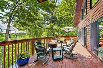 Magnificent home embraced by rhododendrons and hardwood trees - photo 40