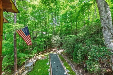 Magnificent home embraced by rhododendrons and hardwood trees - photo 41