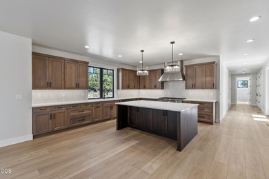 Welcome to this bespoke Craftsman-style villa, nestled in the - photo 18