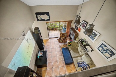 Well-maintained loft-style condo in the gated community of West - photo 3