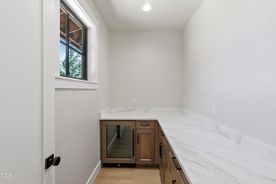 Welcome to this bespoke Craftsman-style villa, nestled in the - photo 46
