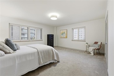 Welcome to this oversized, freshly painted and immaculate condo