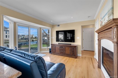 This spectacular expanded ranch sits on a deep waterfront lot - photo 19
