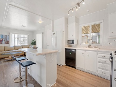 PHOTOS COMING SOON! Welcome to a bright coastal retreat in the - photo 1