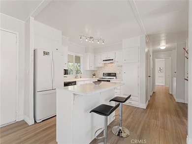 PHOTOS COMING SOON! Welcome to a bright coastal retreat in the - photo 2