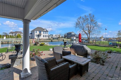 This spectacular expanded ranch sits on a deep waterfront lot - photo 34