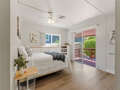 PHOTOS COMING SOON! Welcome to a bright coastal retreat in the - photo 7