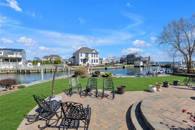 This spectacular expanded ranch sits on a deep waterfront lot - photo 38