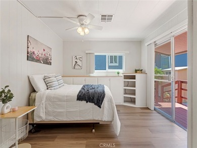 PHOTOS COMING SOON! Welcome to a bright coastal retreat in the - photo 8
