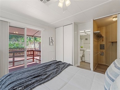 PHOTOS COMING SOON! Welcome to a bright coastal retreat in the - photo 9
