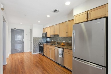 This well-designed junior one-bedroom condo is ready for a new