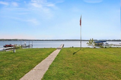 Enjoy refined year-round living on the shores of beautiful Round - photo 3