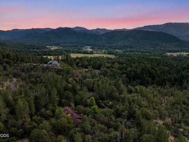 Nestled on 6.48 private wooded acres adjoining BLM land, this - photo 4