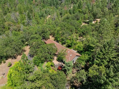 Nestled on 6.48 private wooded acres adjoining BLM land, this - photo 8