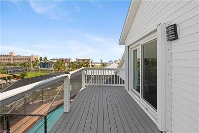 This charming 3-bedroom, 2-bathroom island-style waterfront home - photo 4