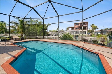 This charming 3-bedroom, 2-bathroom island-style waterfront home - photo 5