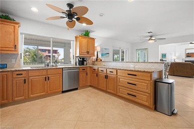 This charming 3-bedroom, 2-bathroom island-style waterfront home - photo 6