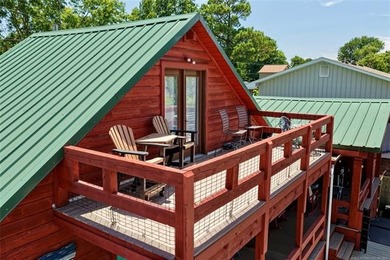 CUTE LOG HOME ON CORNER LOT IN ONE OF THE AREA'S MOST - photo 3
