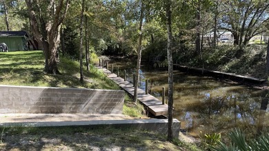 **Prime Canal-Front Lot - Perfect for Your Dream Home** Nestled - photo 12