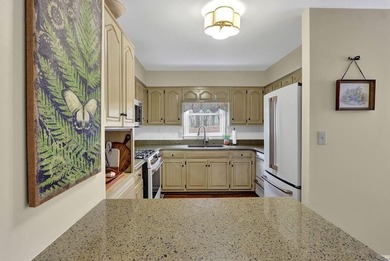 Welcome to this beautifully maintained ranch-style home nestled