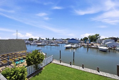 This beautiful waterfront home offers stunning water views and - photo 3
