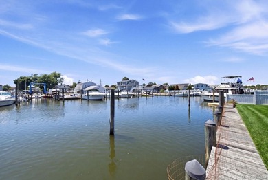 This beautiful waterfront home offers stunning water views and - photo 6