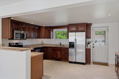 Completely remodeled and expanded, this beautifully maintained - photo 11