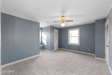 This charming brick home, owned by the same family since it was - photo 22