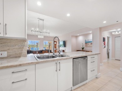 Live the Fisher Island lifestyle in this renovated Bayside - photo 7