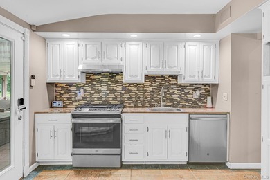 Welcome to 6 Mayflower Lane, an expanded wide-line hi-ranch - photo 8