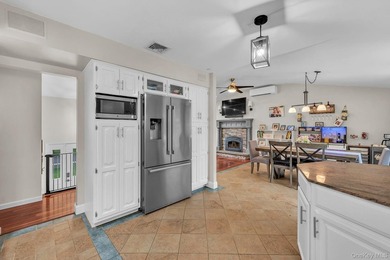 Welcome to 6 Mayflower Lane, an expanded wide-line hi-ranch - photo 9