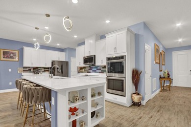 This stunning home features a bright, open-concept design - photo 16