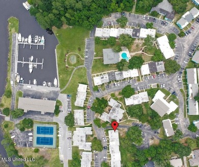 This charming 2 bedroom, 1.5 bath end unit condo is ideally - photo 3