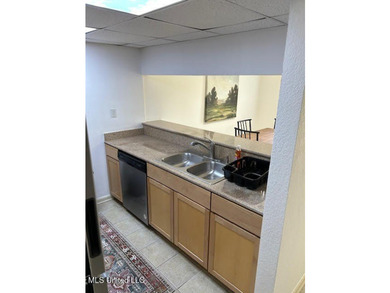 This charming 2 bedroom, 1.5 bath end unit condo is ideally - photo 10