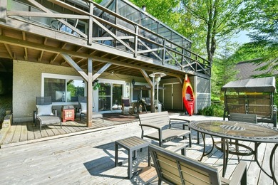Ready to welcome you for the summer, this stunning waterfront - photo 36