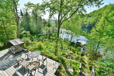 Ready to welcome you for the summer, this stunning waterfront - photo 37