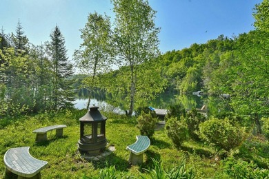 Ready to welcome you for the summer, this stunning waterfront - photo 38