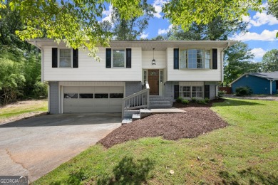 Lake Home For Sale in Flowery Branch, Georgia