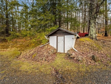 This 222-acre property quietly nestled between large tracts of - photo 21
