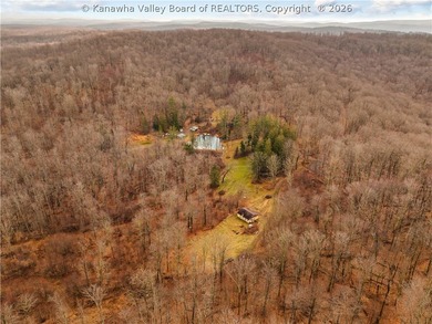 This 222-acre property quietly nestled between large tracts of - photo 37