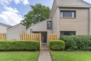 Enjoy peaceful living in this beautifully situated condo just - photo 1
