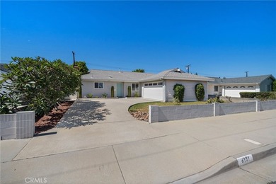 Welcome to 8181 Holland Drive in Huntington Beach's sought-after - photo 1